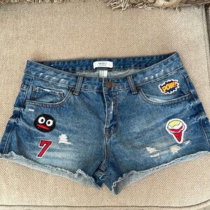 Denim lightly distressed cutoffs